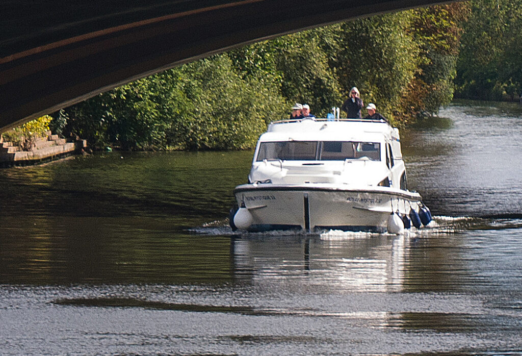 CRUISING ALONG THE RIVER_ Larry Coleman