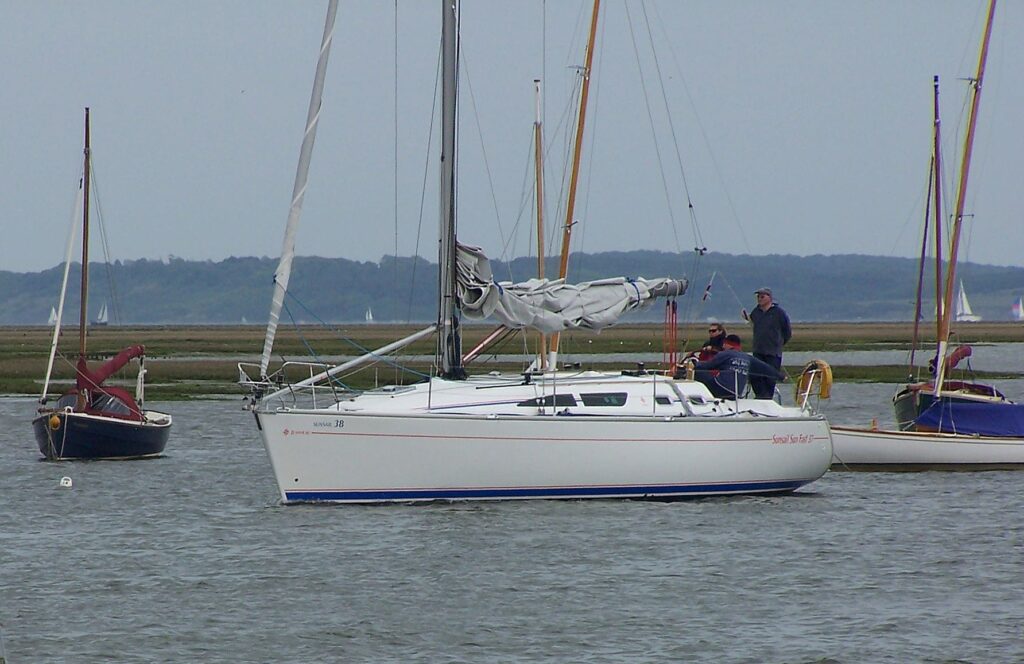 GUIDING THE BOAT_ Larry Coleman